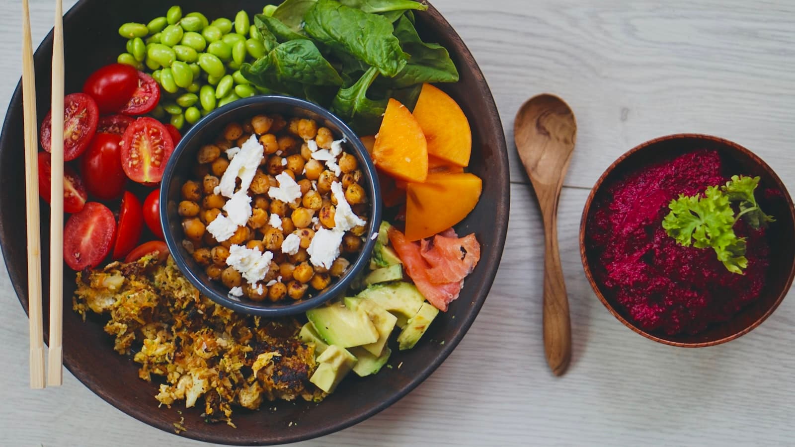 Overhead view of a colorful healthy bowl in warm natural light