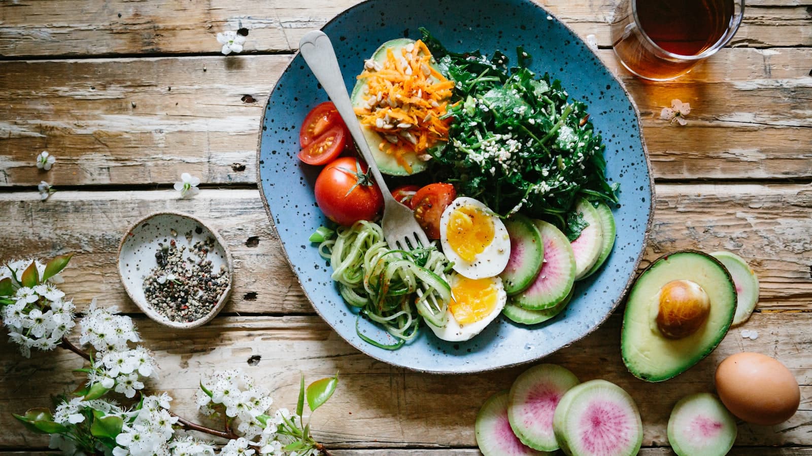 A balanced plate of grilled chicken and vegetables in warm light
